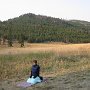 Jean meditates in the Ibex front yard.