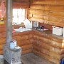 There is a sink but the running water was detached long ago and it empties into a bucket underneath. The accordian-style container is a portion of our water supply.