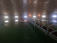 6water  The huge, walk-in clarifier tanks date to the 1920's and are really cool spaces. Solids drop to the bottom and are moved to the center while clear water is taken from the top.
