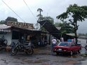 We sought refuge from a sudden storm under the canopy of a market. A wind burst promptly blew it off its moorings. The locals with whom we were sharing the space seemed more amused than upset.