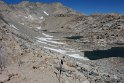We pass glacial tarns (isolated ponds)